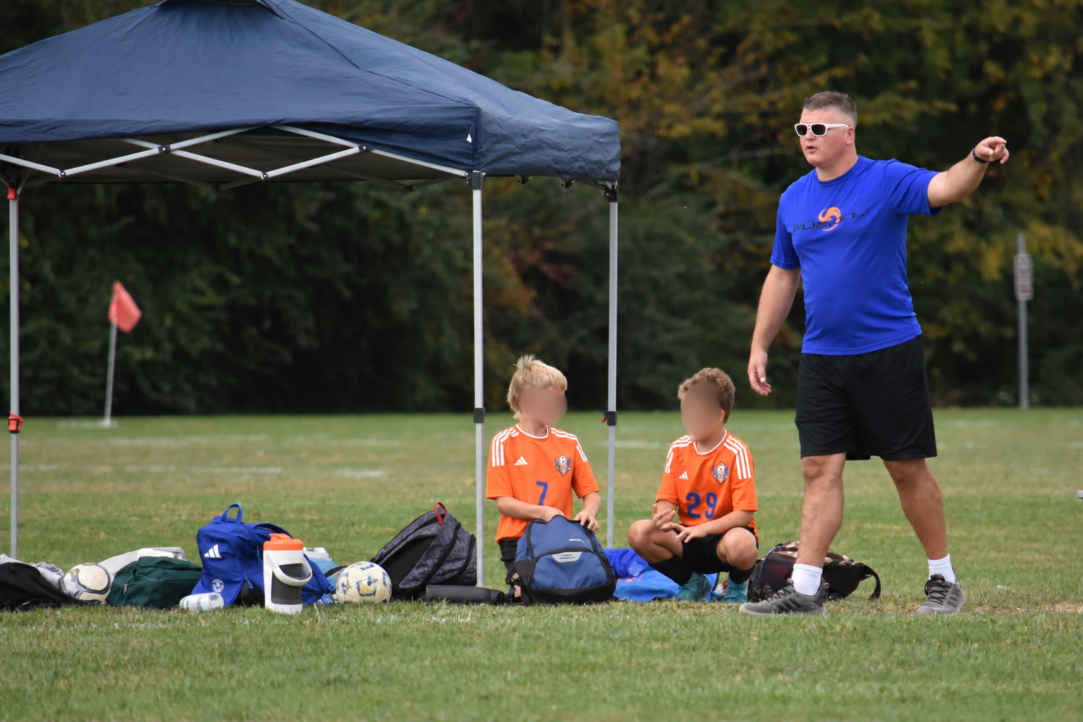 Youth soccer coach on the sidelines